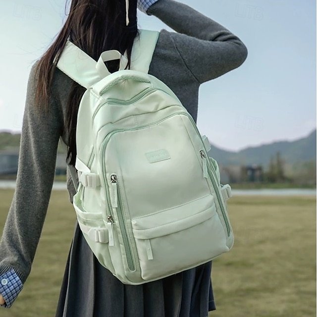 uyddcs1752875270200 Women's Pastel Green School Backpack – Lightweight Large - Image 1